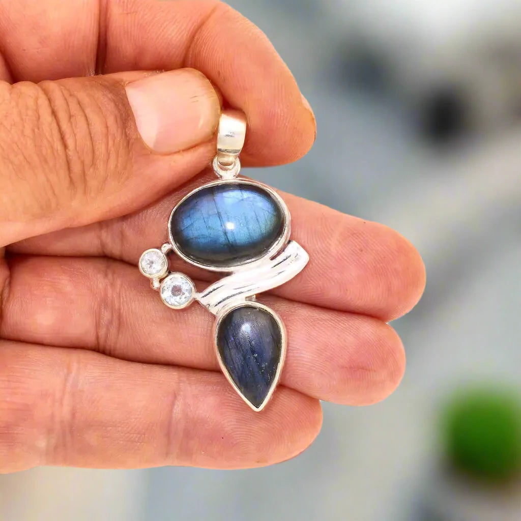 Buy your Wave & Wonder: Labradorite & Blue Topaz Silver Pendant online now or in store at Forever Gems in Franschhoek, South Africa