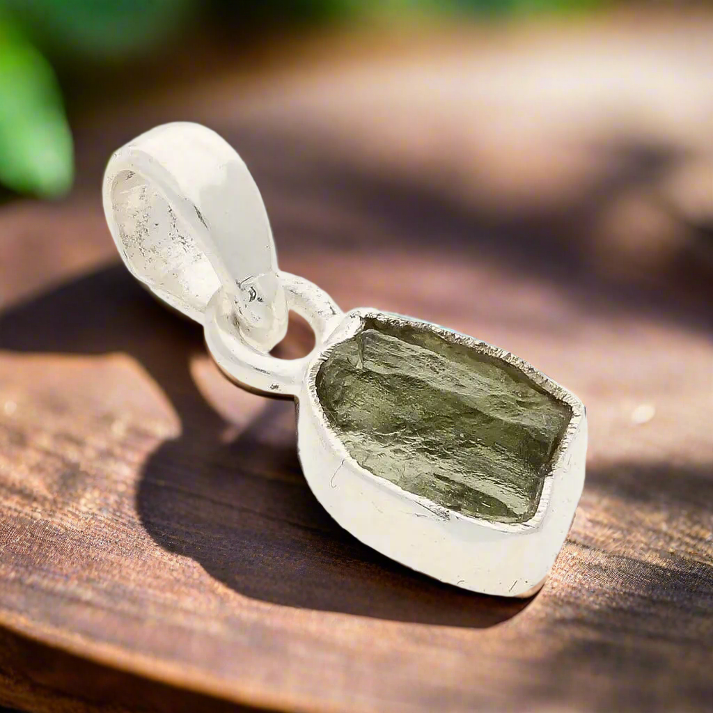 Buy your Timeless Moldavite Silver Necklace Magic online now or in store at Forever Gems in Franschhoek, South Africa