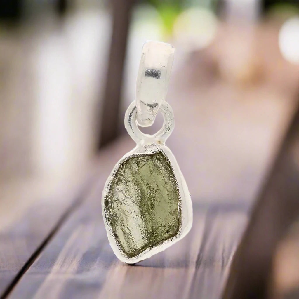 Buy your Timeless Moldavite Silver Necklace Magic online now or in store at Forever Gems in Franschhoek, South Africa