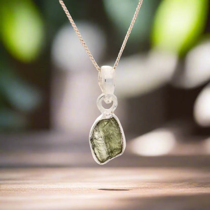 Buy your Timeless Moldavite Silver Necklace Magic online now or in store at Forever Gems in Franschhoek, South Africa