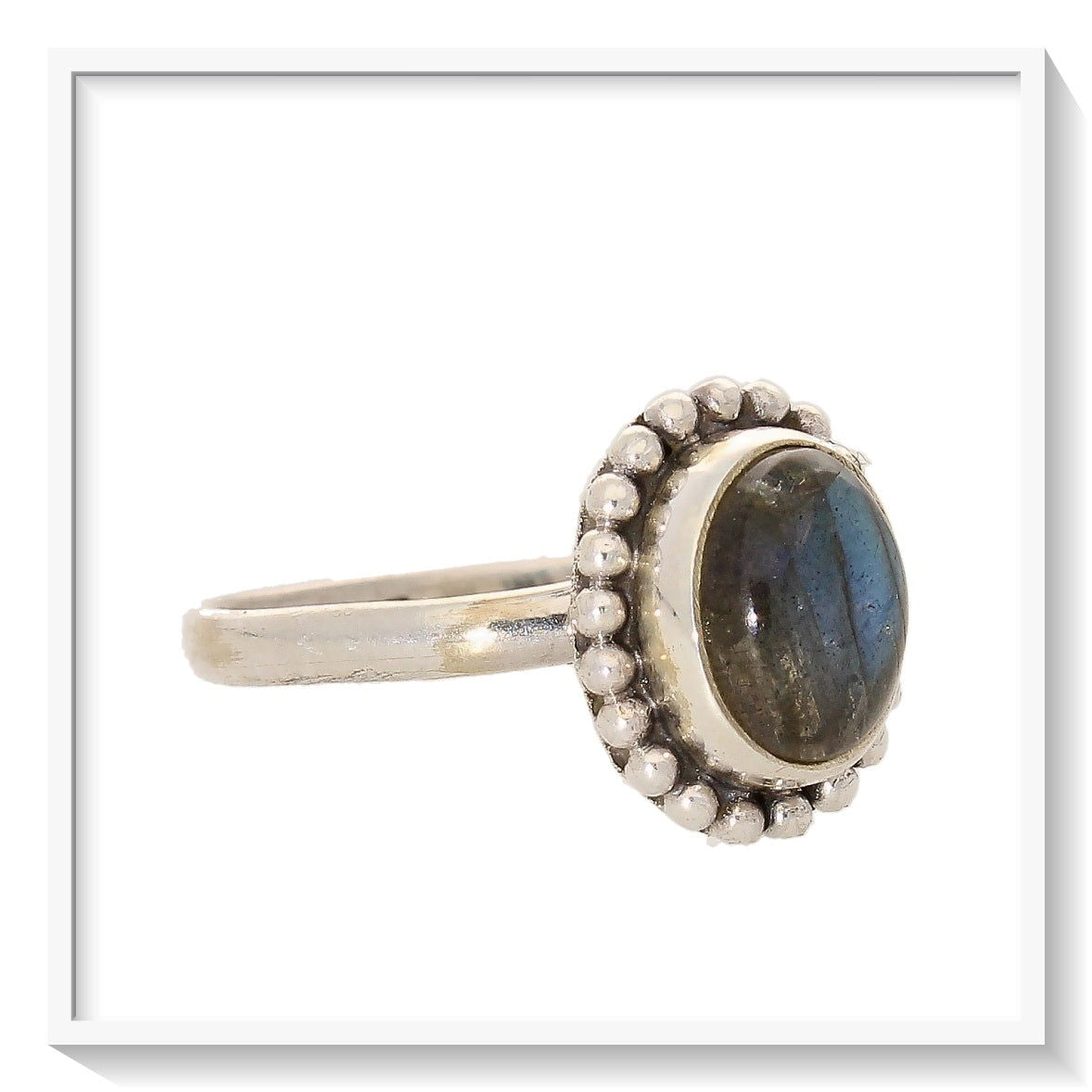 Buy your Enchanting Ballad: Oval Labradorite and Silver Ball Detail Ring online now or in store at Forever Gems in Franschhoek, South Africa