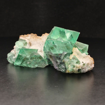 Buy your Fluorite Octahedra on Quartz (Riemvasmaak) online now or in store at Forever Gems in Franschhoek, South Africa