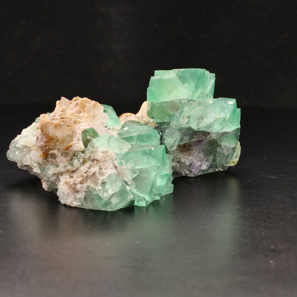 Buy your Fluorite Octahedra on Quartz (Riemvasmaak) online now or in store at Forever Gems in Franschhoek, South Africa