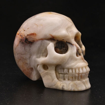 Buy your Joyful Sentinel Crazy Lace Agate Crystal Skull online now or in store at Forever Gems in Franschhoek, South Africa