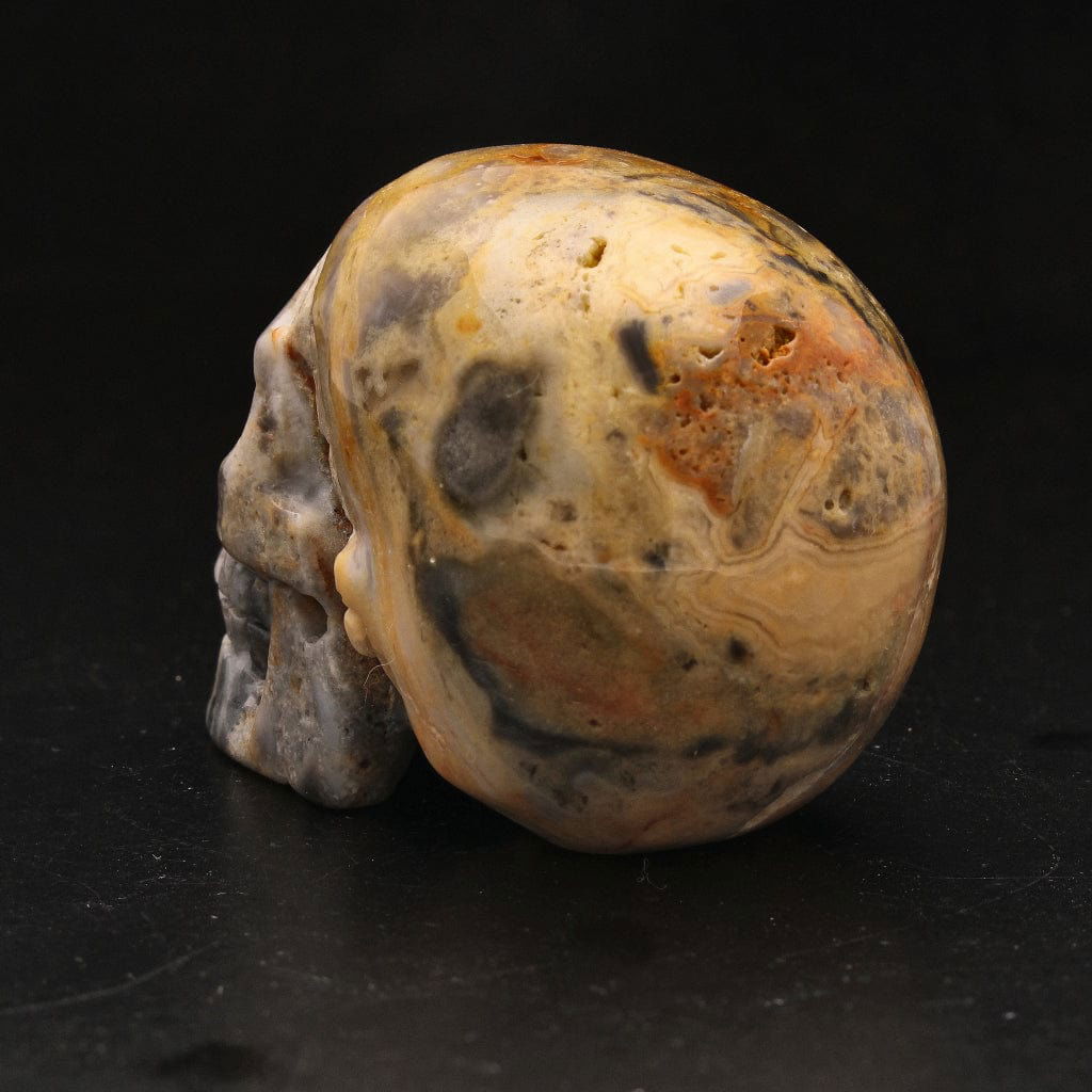 Buy your Joyful Sentinel Crazy Lace Agate Crystal Skull online now or in store at Forever Gems in Franschhoek, South Africa