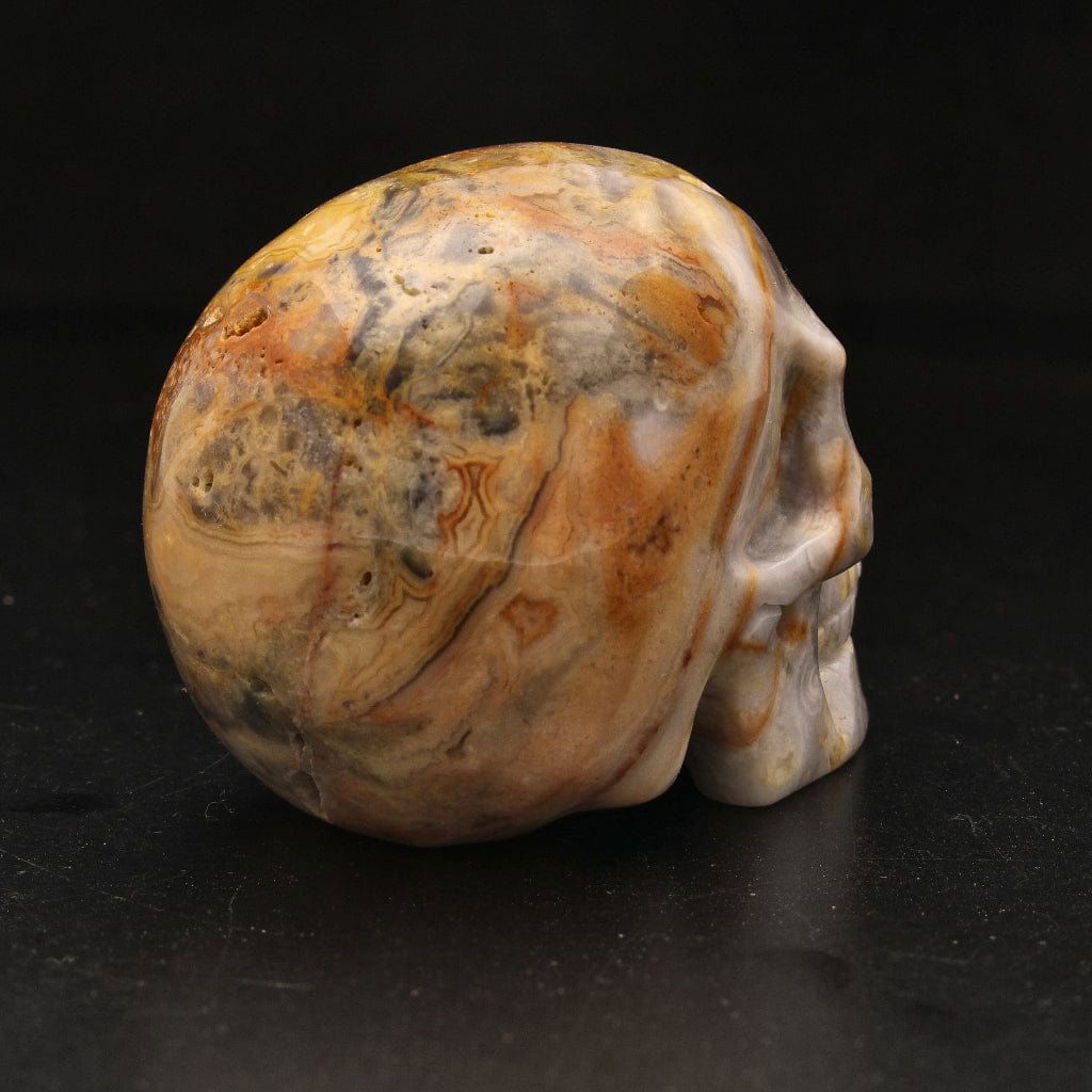 Buy your Joyful Sentinel Crazy Lace Agate Crystal Skull online now or in store at Forever Gems in Franschhoek, South Africa