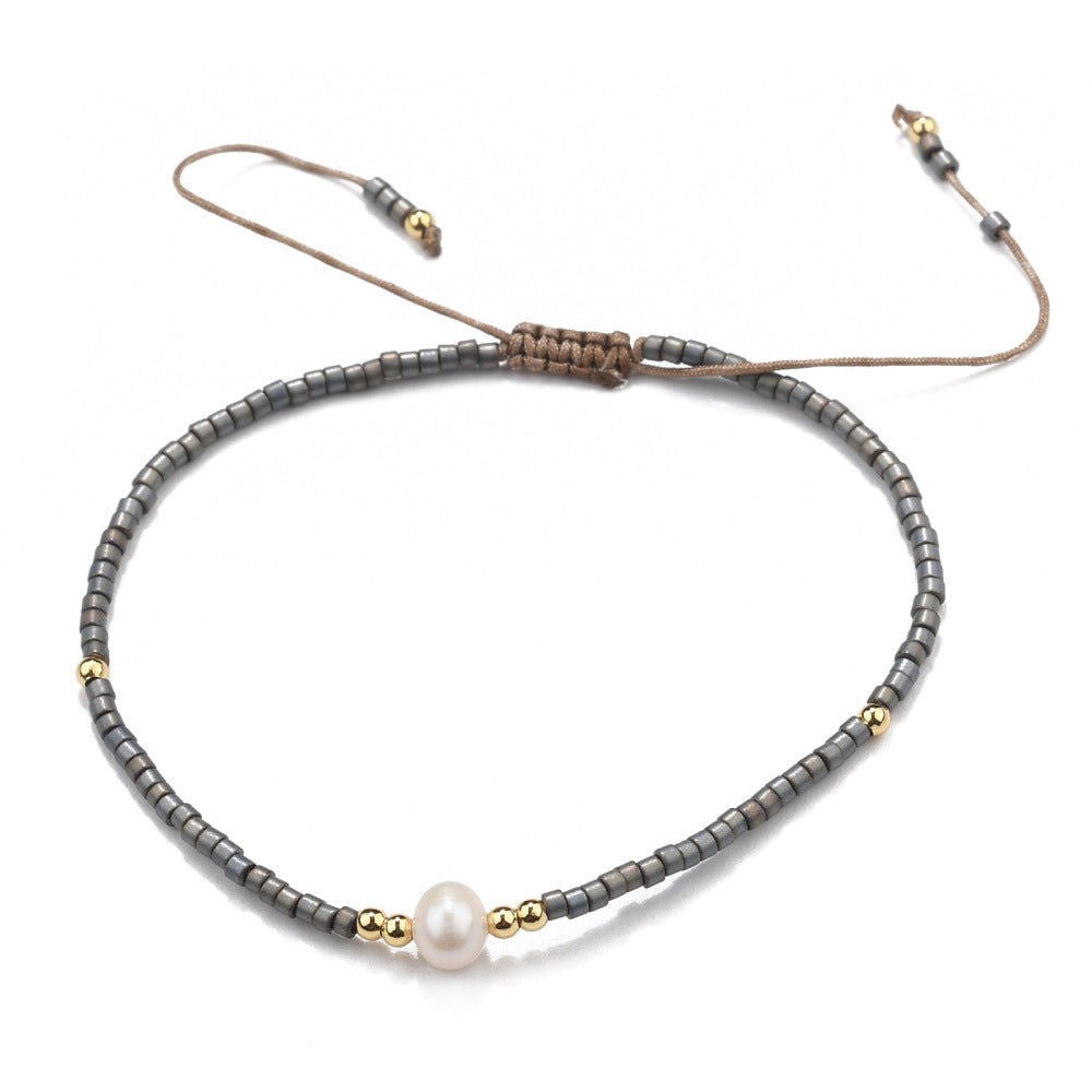 Buy your Pearl & Black Seed Bead Adjustable Bracelet online now or in store at Forever Gems in Franschhoek, South Africa