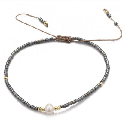 Buy your Pearl & Black Seed Bead Adjustable Bracelet online now or in store at Forever Gems in Franschhoek, South Africa