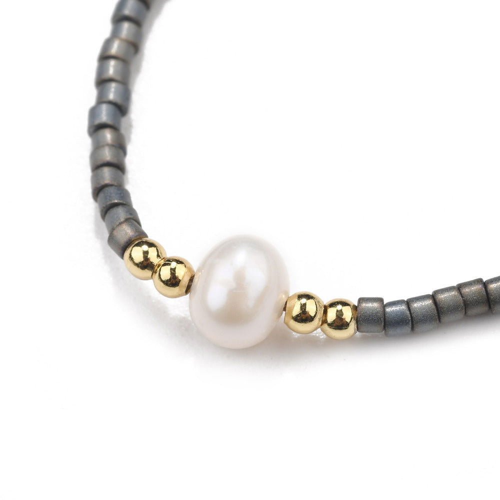 Buy your Pearl & Black Seed Bead Adjustable Bracelet online now or in store at Forever Gems in Franschhoek, South Africa