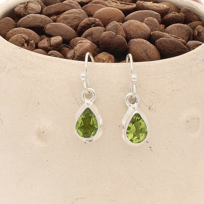 Buy your Teardrop Brilliance: Faceted Peridot Earrings online now or in store at Forever Gems in Franschhoek, South Africa