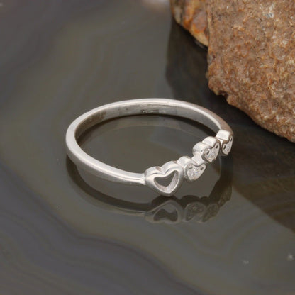 Buy your Tiny Hearts Embrace Silver Band online now or in store at Forever Gems in Franschhoek, South Africa